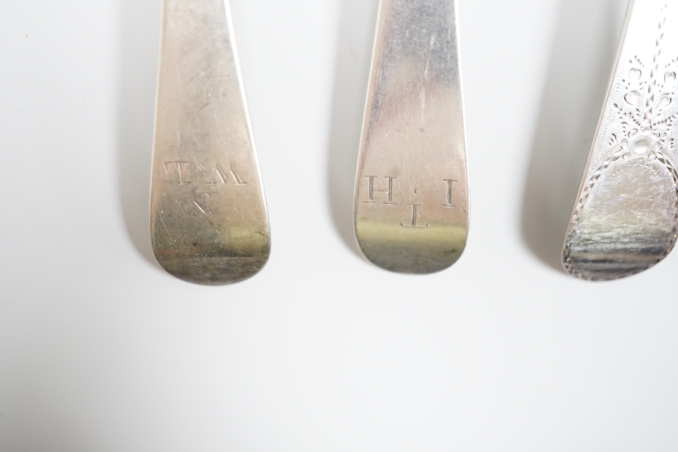A George III silver fiddle pattern basting spoon, London, 1804 and seven other items of mainly 19th century silver flatware, 18.6oz.